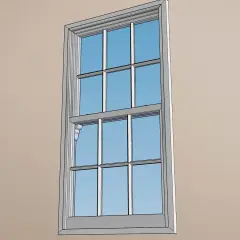 Ventana de guillotina con un clip de seguridad visible en el lateral, listo para quitar.