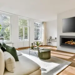 Chimenea de obra moderna sin humo, ideal para tu salón. Aprende como hacer una chimenea de obra que no haga humo y disfruta del calor.