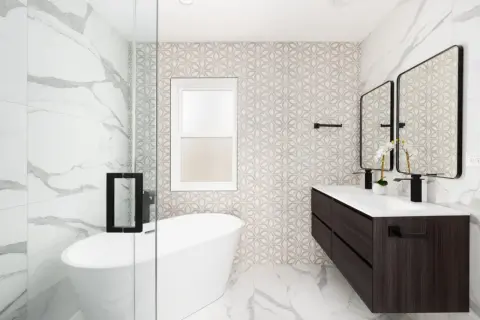 Baño moderno con bañera exenta, lavabo doble y azulejos de diseño. El **pladur para baños** permite estas paredes curvas y acabados impecables.