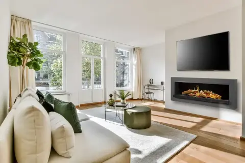 Chimenea de obra moderna sin humo, ideal para tu salón. Aprende como hacer una chimenea de obra que no haga humo y disfruta del calor.