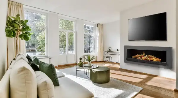Chimenea de obra moderna sin humo, ideal para tu salón. Aprende como hacer una chimenea de obra que no haga humo y disfruta del calor.