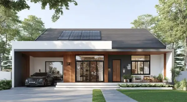 Moderna casa autosuficiente con paneles solares en el tejado, garaje para un coche y un porche acogedor con plantas.