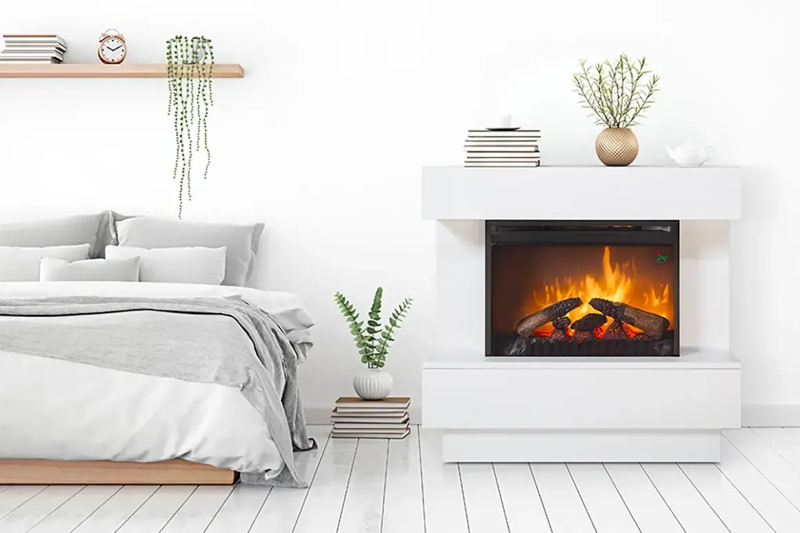 Habitación moderna con cama y chimenea eléctrica, uno de los tipos de estufas más populares.